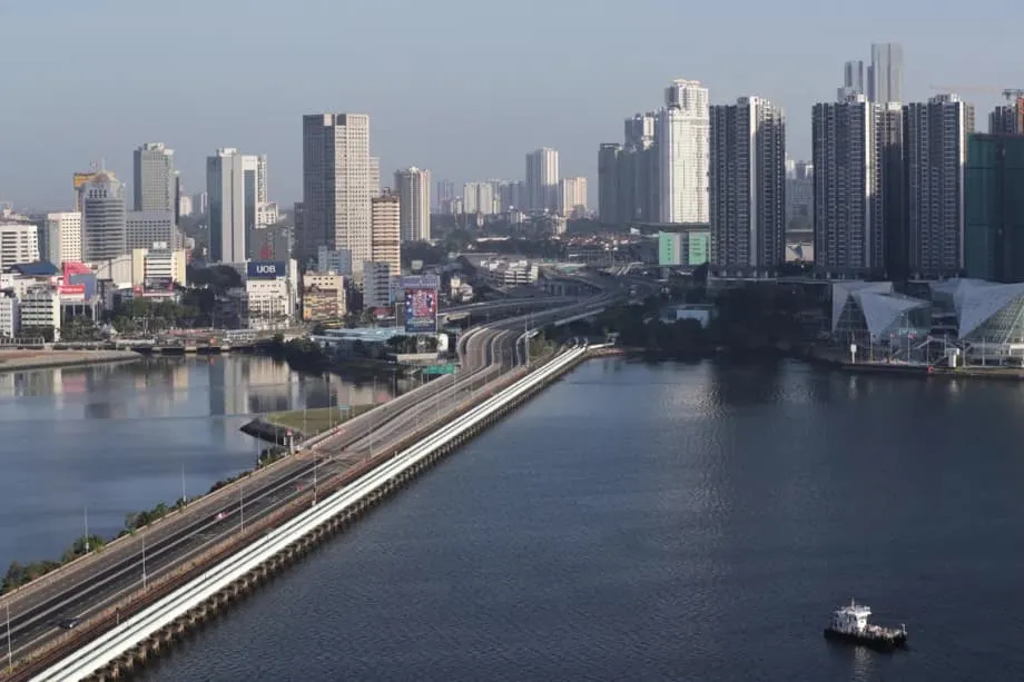 A subida do ringuit põe à prova o apelo dos empregos de Singapura para os malaios